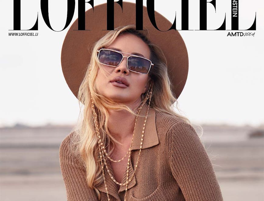 adult female person woman publication accessories knitwear sweater necklace sunglasses